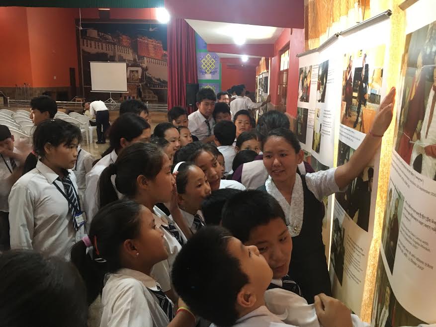 Tibet Museum staff Ms. Tenzin Youtso explaining the exhibits to the students. Photo/Tibet Museum