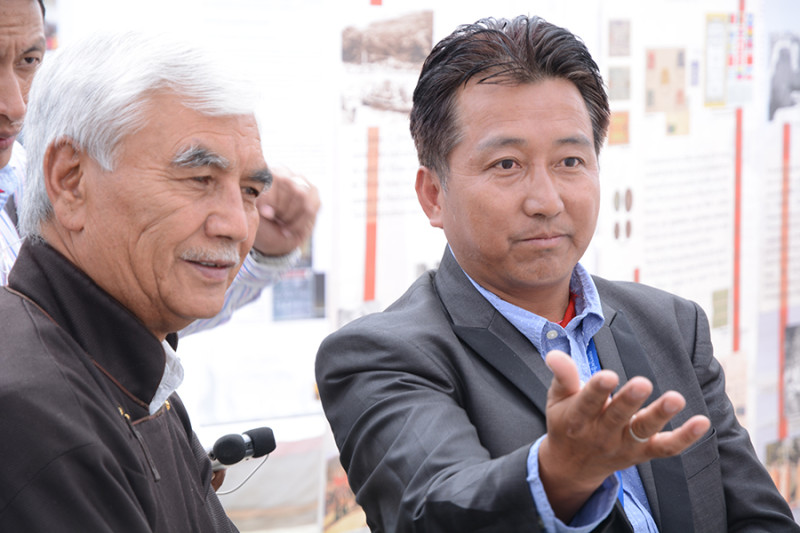 Tashi Phuntsok, Director of Tibet Museum describing the exhibition to Thupstan Chhewang, Member of Parliament and chief guest at the inauguration of the exhibition