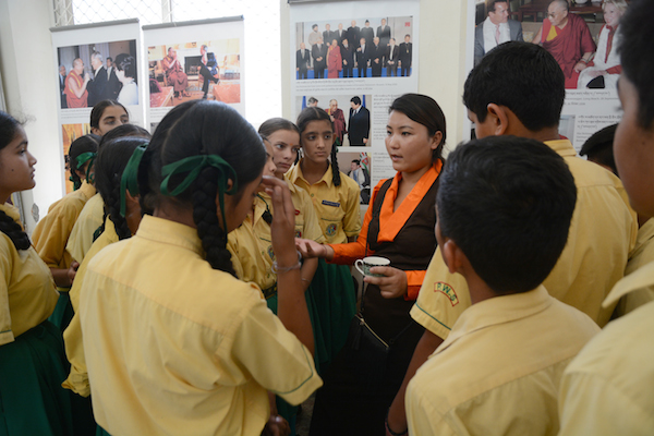 Tibet Museum staff Ms. Tenzin Ingsel explaining the exhibits to the visitors, 17 June 2017. Photo/Tibet Museum