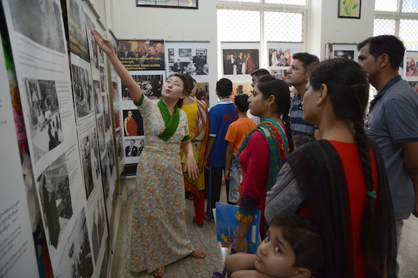 Tibet Museum staff Ms. Yeshi Wangmo explaining the exhibits to the visitors, 17 June 2017. Photo/Tibet Museum